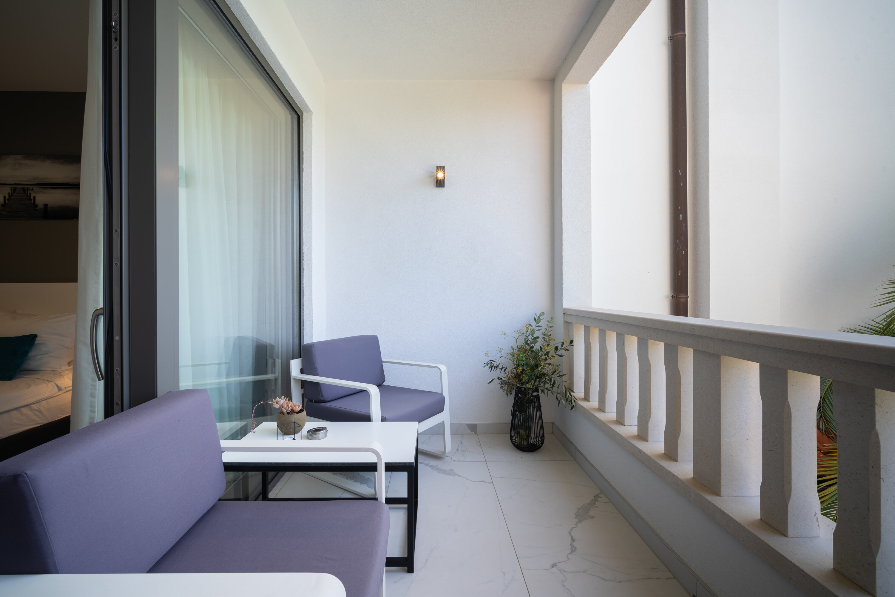 Deluxe Doppelzimmer mit Balkon und Poolblick